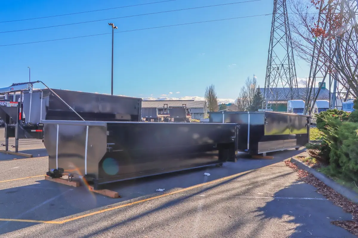 Roll-off dumpster ready for waste disposal at job site for Commercial Dumpster Rental in Siler City